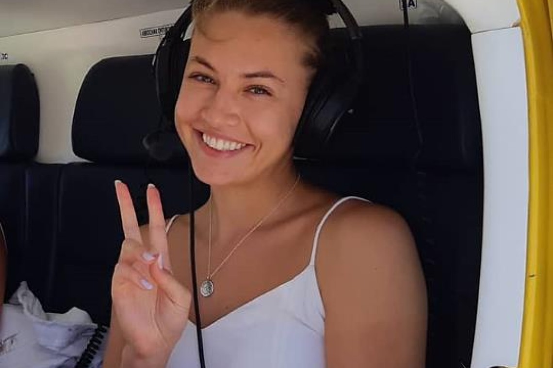 Helicopter mid-flight against the sky